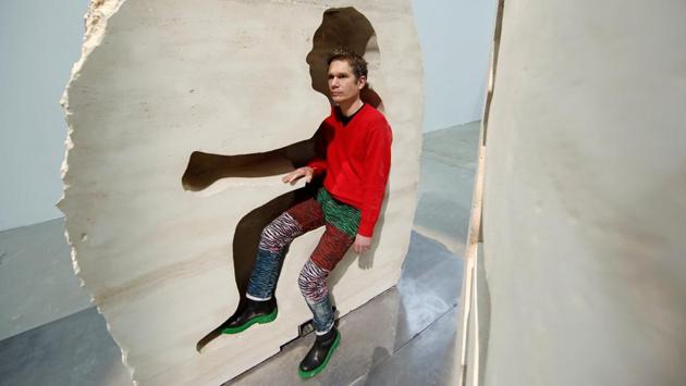 French artist Abraham Poincheval poses inside his artwork, Pierre ("Stone") in Paris, France, as he presents his upcoming project, living inside a rock for a week from February 22. (Benoit Tessier / REUTERS)