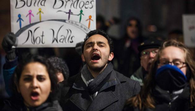 Demonstrators take part in a dance party outside Trump International Hotel organized by WERK for Peace to protest executive orders passed by US President Donald Trump in Washington, DC . (AFP) Demonstrators take part in a dance party outside Trump International Hotel organized by WERK for Peace to protest executive orders passed by US President Donald Trump in Washington, DC . (AFP)