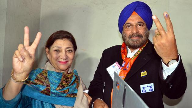 SAD candidate from Patiala JJ Singh gen (retd) along with his wife Anupma Singh after casting his vote at PWD office in Baradari garden Patiala on Saturday. (Bharat Bhushan/HT Photo)