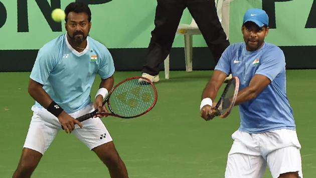 India's Leander Paes (L) and Vishnu Vardhan (R) compete in the Davis Cup doubles tennis match against New Zealand's Artem Sitak and Michael Venus.(AFP) India's Leander Paes (L) and Vishnu Vardhan (R) compete in the Davis Cup doubles tennis match against New Zealand's Artem Sitak and Michael Venus.(AFP)