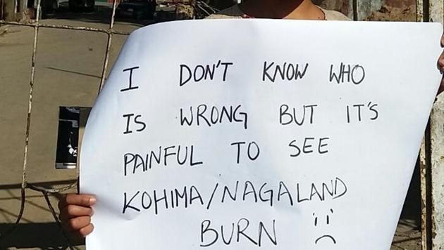 Rugotsono Iralu, a Kohima resident, expresses her feelings about the recent events outside the burnt Kohima Municipal building on Sunday.(Utpal Parashar/HT Photo) Rugotsono Iralu, a Kohima resident, expresses her feelings about the recent events outside the burnt Kohima Municipal building on Sunday.(Utpal Parashar/HT Photo)