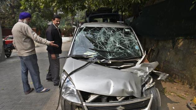 The WagonR crashed through an iron fence and collided with an electricity pole and turned on its right killing Pattrick Anthony in Chanakyapuri on Sunday. (Sushil Kumar/HT PHOTO) The WagonR crashed through an iron fence and collided with an electricity pole and turned on its right killing Pattrick Anthony in Chanakyapuri on Sunday. (Sushil Kumar/HT PHOTO)