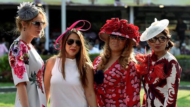 Women pose for a picture at Mahalaxmi Racecourse in Mumbai. (Kunal Patil/Hindustan Times) 