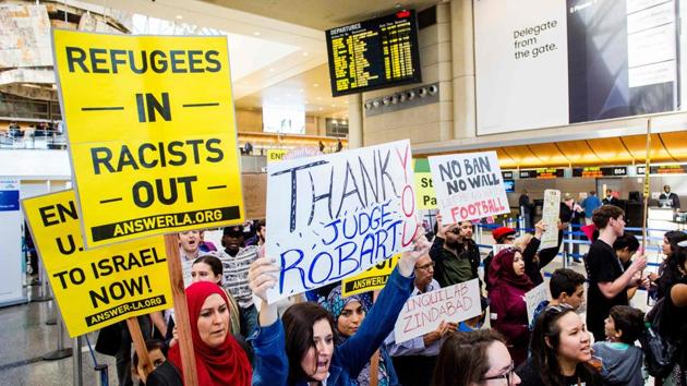 People protest the executive order by US President Donald Trump, banning immigrants from seven majority-Muslim countries at Los Angeles International Airport in Los Angeles, California. (AFP Photo) People protest the executive order by US President Donald Trump, banning immigrants from seven majority-Muslim countries at Los Angeles International Airport in Los Angeles, California. (AFP Photo)