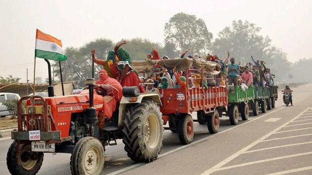 Jat women protesters on tractor on their way to Jassia village to take part in the agitation for reservation at Jassia village in Rohtak on Sunday.(PTI Photo) Jat women protesters on tractor on their way to Jassia village to take part in the agitation for reservation at Jassia village in Rohtak on Sunday.(PTI Photo)