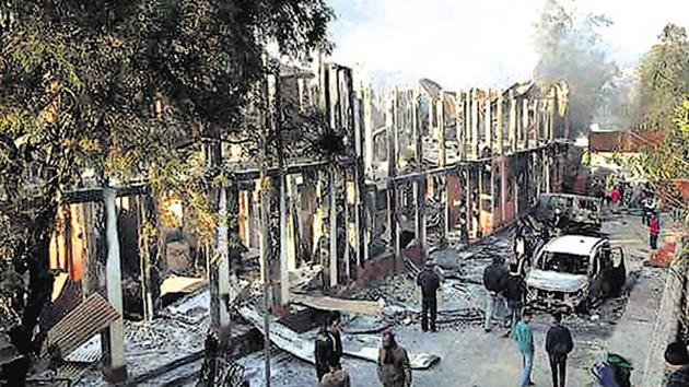 Naga tribals set ablaze the Kohima Municipal Council office and the office of the district collector during a protest on Friday.(PTI Photo)
