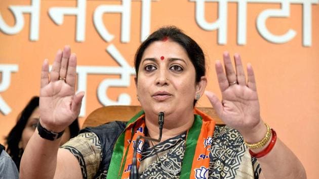 Textiles minister and BJP leader Smriti Irani addresses a press conference at the party office in Lucknow.(PTI Photo)