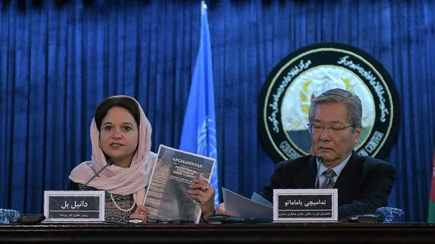 Danielle Bell (left), director of human rights of the UN Assistance Mission in Afghanistan (UNAMA), holds up a copy of a report of civilian casualties, as Tadamichi Yamamoto, the UN secretary-general’s special representative for Afghanistan, looks on during a press conference in Kabul on Monday. (AFP) Danielle Bell (left), director of human rights of the UN Assistance Mission in Afghanistan (UNAMA), holds up a copy of a report of civilian casualties, as Tadamichi Yamamoto, the UN secretary-general’s special representative for Afghanistan, looks on during a press conference in Kabul on Monday. (AFP)