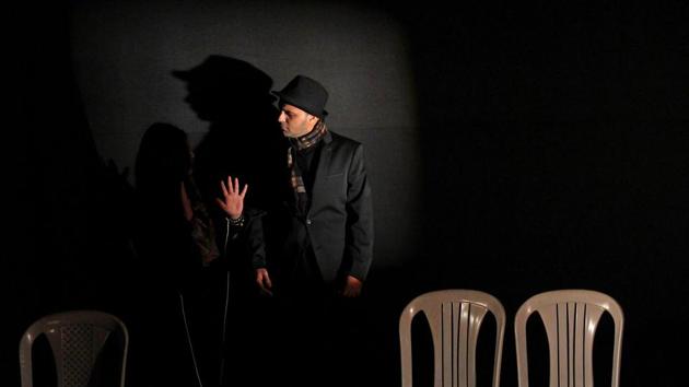 Artists perform a play titled ‘The Struggler' at Fort in Mumbai on Sunday. (Ht photo)