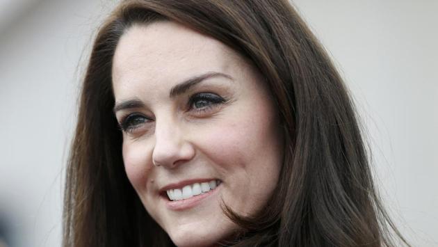 Kate, the Duchess of Cambridge, prepares to take part in a relay race during the promotion of the charity Heads Together at the Queen Elizabeth II Park in London. (REUTERS)