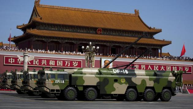 File photo from September 2015 shows vehicles carrying the DF-16 ballistic missiles past Tiananmen Gate during a military parade to commemorate the 70th anniversary of the end of World War II. The highly accurate ballistic missile capable of threatening US and Japanese bases in Asia made its latest appearance at recent Rocket Force drills. The DF-16 featured in a video posted on the defence ministry's website showed the missiles aboard their 10-wheeled mobile launch vehicles being deployed in deep forests during exercises over the just concluded Lunar New Year holiday.(AP)