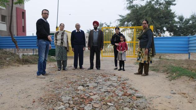Motorbikes often get stuck in these potholes and the residents even have trouble walking on these roads (Parveen Kumar/HT) Motorbikes often get stuck in these potholes and the residents even have trouble walking on these roads (Parveen Kumar/HT)