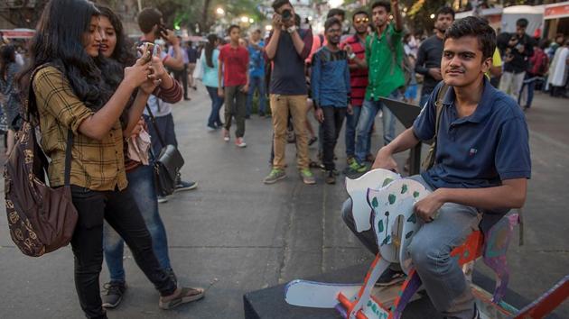 Young at heart: A youngster seems to be reliving one of his favourite childhood moments. (Satish Bate/HT PHOTO) 