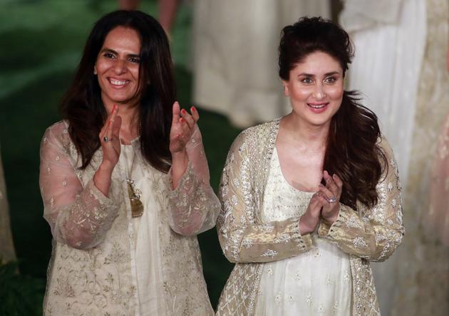 Bollywood actress Kareena Kapoor right, stands along with designer Anita Dongre at the end her grand finale during the Lakme Fashion Week in Mumbai, India, Sunday, Feb. 5, 2017 . (AP Photo/Rafiq Maqbool) (AP) Bollywood actress Kareena Kapoor right, stands along with designer Anita Dongre at the end her grand finale during the Lakme Fashion Week in Mumbai, India, Sunday, Feb. 5, 2017 . (AP Photo/Rafiq Maqbool) (AP)