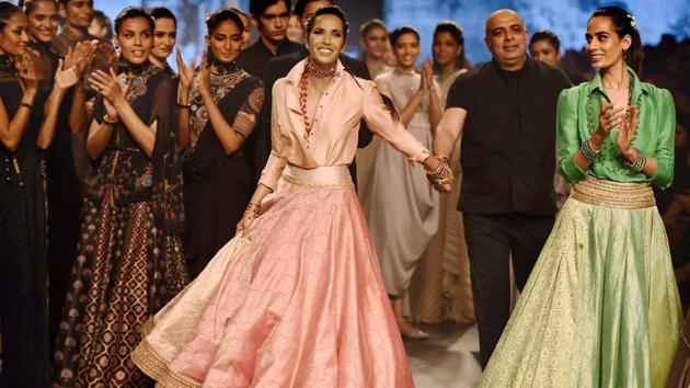 Former supermodel Padma Lakshmi walks the ramp displaying the collection of designer Tarun Tahiliani at the fashion week. (PTI) Former supermodel Padma Lakshmi walks the ramp displaying the collection of designer Tarun Tahiliani at the fashion week. (PTI)