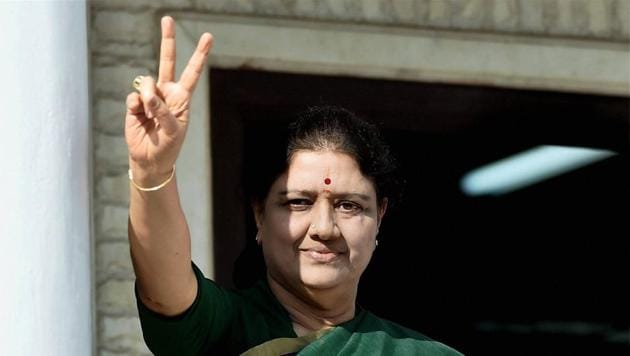 AIADMK general secretary V K Sasikala flashes a victory sign after attending a meeting of the MLAs of the party that elected her as the legislative party leader, at AIADMK headquarters in Chennai on Sunday.(PTI)