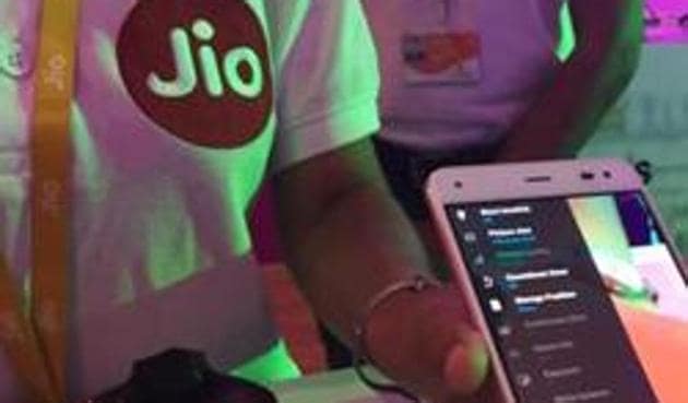 A Reliance employee demonstrates Jio LYF phone at their headquarters on the outskirts of Mumbai.(REUTERS)