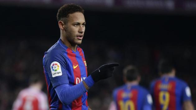 FC Barcelona's Neymar celebrates after scoring a penalty during a Copa del Rey, 16 round, second leg, between FC Barcelona and Athletic Bilbao at the Camp Nou in Barcelona, Spain, Wednesday, Jan. 11, 2017. (AP Photo/Manu Fernandez)(AP)