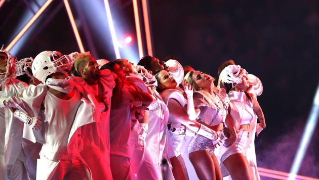 Unlike some predecessors, who often brought in several guest stars to bolster their acts, Gaga handled it herself. (AFP)