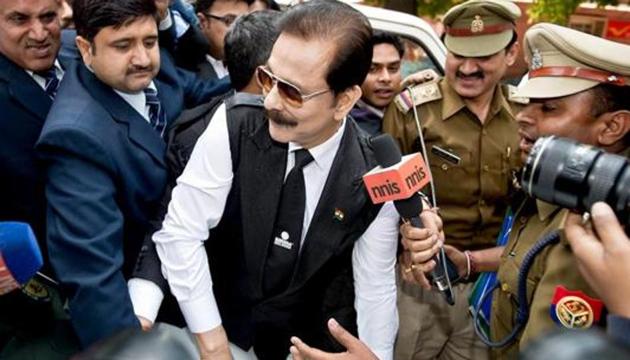 In this 2014 photo, security officials escort Sahara group chairman Subrata Roy (C) on his arrival at the Supreme Court in New Delhi. (AFP) In this 2014 photo, security officials escort Sahara group chairman Subrata Roy (C) on his arrival at the Supreme Court in New Delhi. (AFP)
