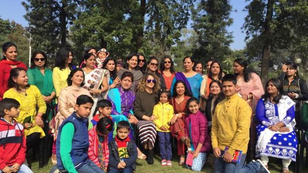 Kangana Ranaut poses with the families of soldiers in Jammu. Kangana Ranaut poses with the families of soldiers in Jammu.
