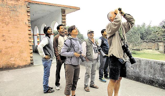 Two Czech tourists at the breeding site of greater adjutants at Kadwa diara in Bhagalpur district of Bihar.(HT PHOTO) Two Czech tourists at the breeding site of greater adjutants at Kadwa diara in Bhagalpur district of Bihar.(HT PHOTO)