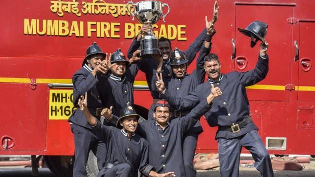 The Andheri fire unit celebrate their win in the competition. (Kunal Patil/Ht photo)