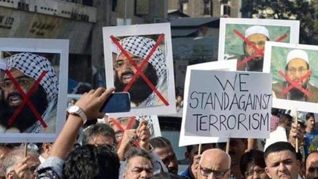 People carry photographs of JeM chief of Maulana Masood Azhar (L) and chief of Pakistan's outlawed Islamic hardline Jamaat ud Dawa (JD), Hafiz Mohammad Saeed (R) during a protest against the attack on the air force base in Pathankot, in Mumbai on January 4, 2016. (AFP File) People carry photographs of JeM chief of Maulana Masood Azhar (L) and chief of Pakistan's outlawed Islamic hardline Jamaat ud Dawa (JD), Hafiz Mohammad Saeed (R) during a protest against the attack on the air force base in Pathankot, in Mumbai on January 4, 2016. (AFP File)