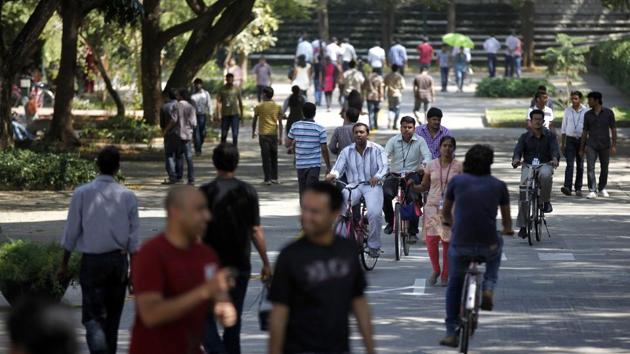 In this Jan. 11, 2013 file photo, Infosys Technologies employees move through the headquarters during a break in Bangalore, India. (AP Photo) In this Jan. 11, 2013 file photo, Infosys Technologies employees move through the headquarters during a break in Bangalore, India. (AP Photo)