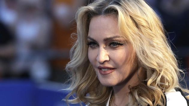 Madonna poses for photographers upon arrival at the World premiere of the film The Beatles, Eight Days a Week in London. (AP) Madonna poses for photographers upon arrival at the World premiere of the film The Beatles, Eight Days a Week in London. (AP)