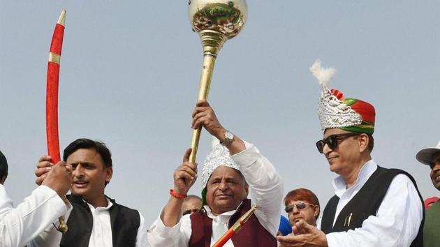 Samajwadi Party patriarch Mulayam Singh Yadav holds a mace as Uttar Pradesh chief minister Akhilesh Yadav and PWD minister Azam Khan during an event in Unnao of UP. Father Mulayam Singh has agreed to campaign for son Akhilesh Yadav as the battle for the UP throne grows intense. (PTI file photo) Samajwadi Party patriarch Mulayam Singh Yadav holds a mace as Uttar Pradesh chief minister Akhilesh Yadav and PWD minister Azam Khan during an event in Unnao of UP. Father Mulayam Singh has agreed to campaign for son Akhilesh Yadav as the battle for the UP throne grows intense. (PTI file photo)
