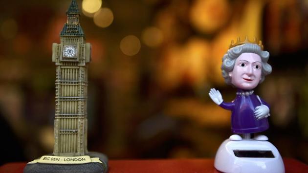 A figure of Britain's Queen Elizabeth is displayed for sale in the window of a shop in central London, Britain, February 6, 2017. Last year the queen, 90, surpassed Queen Victoria as the longest reigning monarch. She has served more than 13 British prime ministers and has been in power during 13 U.S. presidencies. (Hannah McKay / REUTERS)