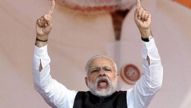 Prime Minister Narendra Modi addresses the BJP's Parivartan Sankalp Rally in Ghaziabad on Wednesday ahead of the UP Assembly polls. (PTI Photo) Prime Minister Narendra Modi addresses the BJP's Parivartan Sankalp Rally in Ghaziabad on Wednesday ahead of the UP Assembly polls. (PTI Photo)