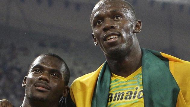 Jamaican sprinter, Nesta Carter (left) with Usain Bolt while celebrating the gold medal in the 4x100m relay at the 2008 Beijing Olympics. Bolt has been stripped of one of his nine Olympic gold medals after Carter was found positive in a re-test for doping. (AP) Jamaican sprinter, Nesta Carter (left) with Usain Bolt while celebrating the gold medal in the 4x100m relay at the 2008 Beijing Olympics. Bolt has been stripped of one of his nine Olympic gold medals after Carter was found positive in a re-test for doping. (AP)