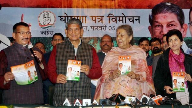Uttarakhand CM Harish Rawat with Congress leader Ambika Soni and others releasing the party's manifesto for the upcoming assembly elections. (PTI) Uttarakhand CM Harish Rawat with Congress leader Ambika Soni and others releasing the party's manifesto for the upcoming assembly elections. (PTI)