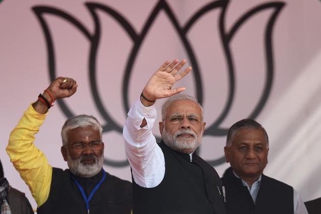 Prime Minister Narendra Modi waves after delivering a speech during a state assembly election rally in Ghaziabad on February 8, 2017.(AFP)