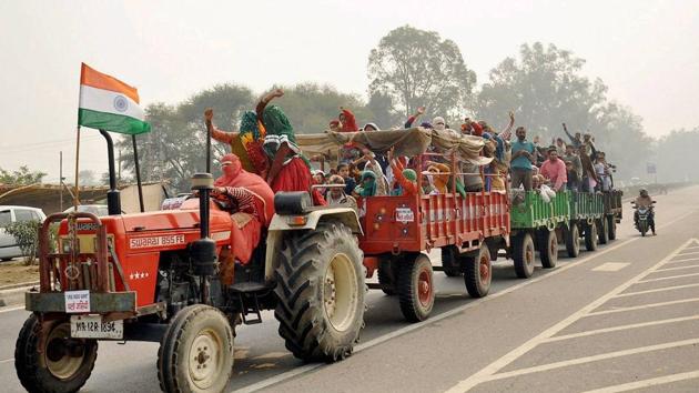Jat women protesters are seen on a tractor at Jassia village as they demand reservation, in Rohtak . The agitation for quota reservation by Jats, which was confined to Haryana so far, has started spreading to parts of Delhi. (PTI)