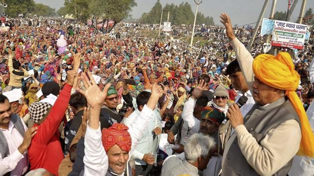 AIJASS national president Yashpal Malik speaks  during the Jat protest at Jassia village in Rohtak. (PTI Photo) 