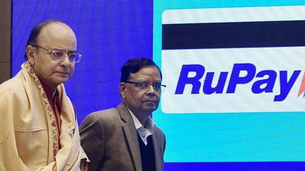 Union finance minister Arun Jaitley and Vice Chairman, NITI Aayog, Arvind Panagariya at the launch ceremony of the DigiDhan Mela to popularize cashless transactions, in New Delhi on December 25, 2016.(PTI)