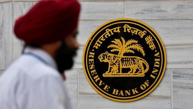 People walk past the Reserve Bank of India (RBI) head office in Mumbai. (Reuters File Photo) People walk past the Reserve Bank of India (RBI) head office in Mumbai. (Reuters File Photo)