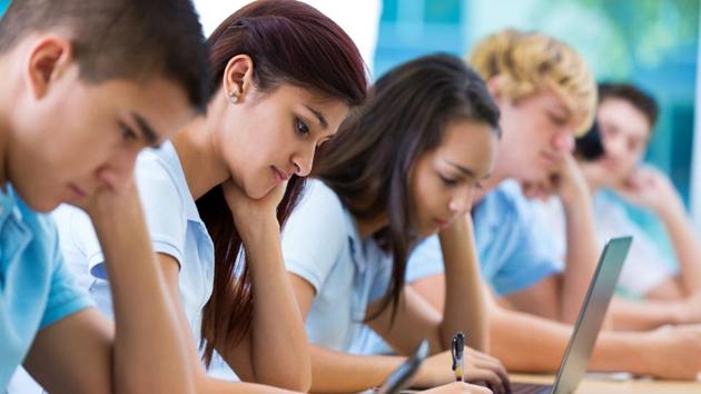A study has revealed that discrimination of weight by teachers may be the major reason for the low score of obese female students in school. (Getty Images)