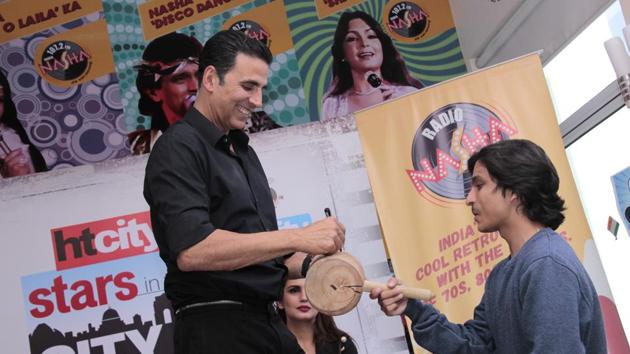 The actors signed a gavel for the Fever 104 FM team. (SHIVAM saxena/ht photo) 