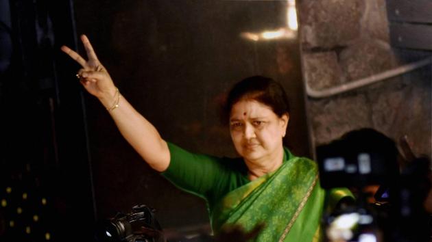 AIADMK general secretary V K Sasikala flashes victory sign as she comes out to address media at Poes garden in Chennai in the early hours on Wednesday.(PTI Photo) AIADMK general secretary V K Sasikala flashes victory sign as she comes out to address media at Poes garden in Chennai in the early hours on Wednesday.(PTI Photo)