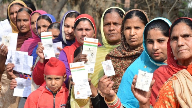 Voters showing their ID cards before casting vote during the re-polling at a polling station in Majitha constituency in Amritsar on Thursday. (Gurpreet Singh/HT Photo) Voters showing their ID cards before casting vote during the re-polling at a polling station in Majitha constituency in Amritsar on Thursday. (Gurpreet Singh/HT Photo)