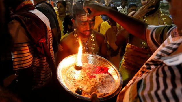 The annual festival has become a major cultural highlight and takes place on a grand scale at the Sri Subramaniar Swamy Devasthanam Temple at Batu Caves just outside of Kuala Lumpur, Malayasia. It commemorates the day when the goddess Parvathi gave her son Lord Murugan a powerful lance to fight evil demons. (Lai Seng Sin b/ REUTERS) The annual festival has become a major cultural highlight and takes place on a grand scale at the Sri Subramaniar Swamy Devasthanam Temple at Batu Caves just outside of Kuala Lumpur, Malayasia. It commemorates the day when the goddess Parvathi gave her son Lord Murugan a powerful lance to fight evil demons. (Lai Seng Sin b/ REUTERS)