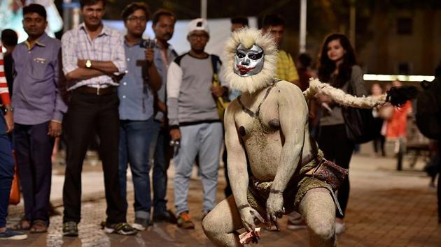 An artiste entertains people at the festival. (Arijit Sen/HT PHOTO) 