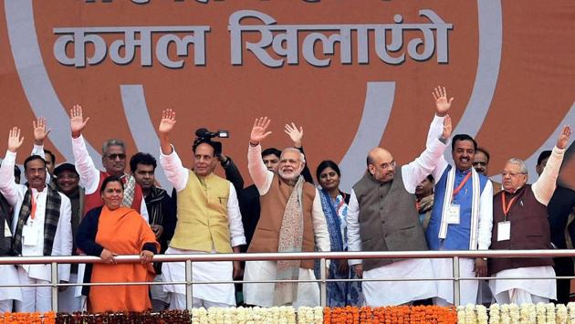 Prime Minister Narendra Modi with BJP National president Amit Shah, Rajnath Singh, Keshav Prasad Maurya and other leaders wave during the Parivartan Rally in Lucknow on Monday. (Nand Kumar / PTI)