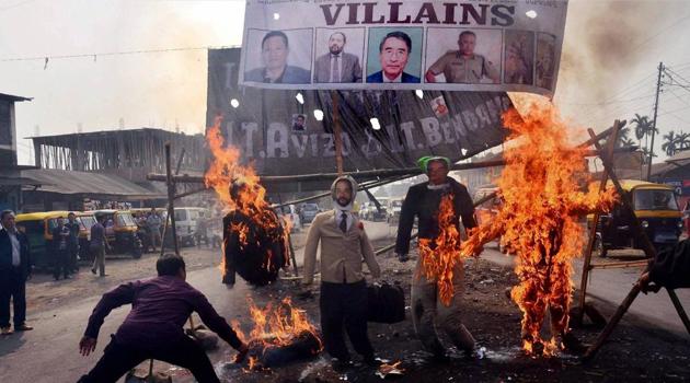 Protesters burn effigy of Nagaland chief minister TR Zeliang, home minister Y Patton, NPF President Shürhozelie and Nagaland IRB personnel during a protest against killing of two youth by security personnel last month, in Dimapur, Nagaland on Feb 7, 2017. (PTI) Protesters burn effigy of Nagaland chief minister TR Zeliang, home minister Y Patton, NPF President Shürhozelie and Nagaland IRB personnel during a protest against killing of two youth by security personnel last month, in Dimapur, Nagaland on Feb 7, 2017. (PTI)