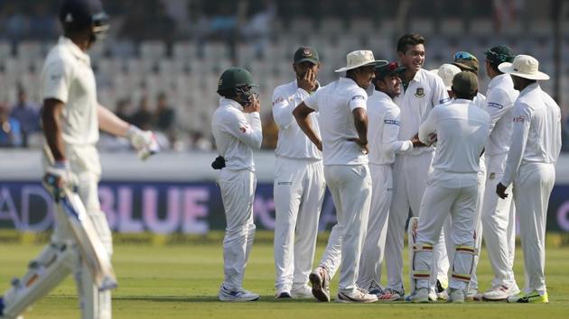 Bangladesh's Taskin Ahmed celebrates the dismissal of India's Lokesh Rahul. (AP)