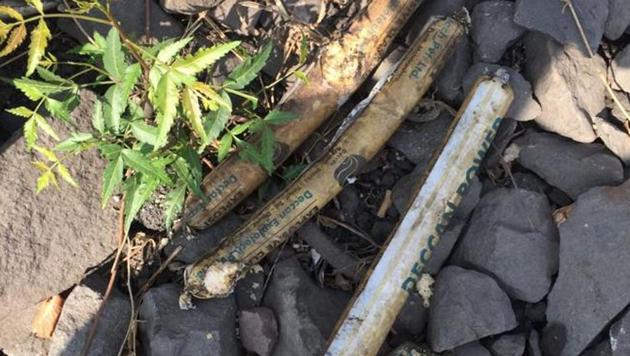 While there were no detonators or wires attached to the sticks, ruling out the possibility of them having caused a blast, officials from the anti-terrorism squad (ATS), special investigation department (SID) and the Intelligence Bureau (IB) are probing the incident. (HT photo) While there were no detonators or wires attached to the sticks, ruling out the possibility of them having caused a blast, officials from the anti-terrorism squad (ATS), special investigation department (SID) and the Intelligence Bureau (IB) are probing the incident. (HT photo)